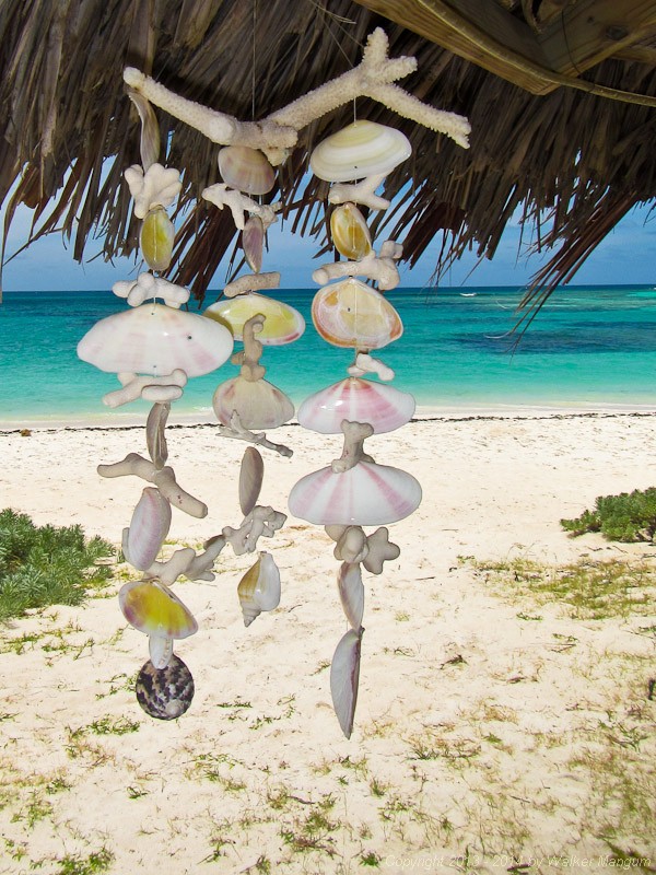 Nancy's craft for the day - a beach treasure wind chime  at Anegada, BVI.