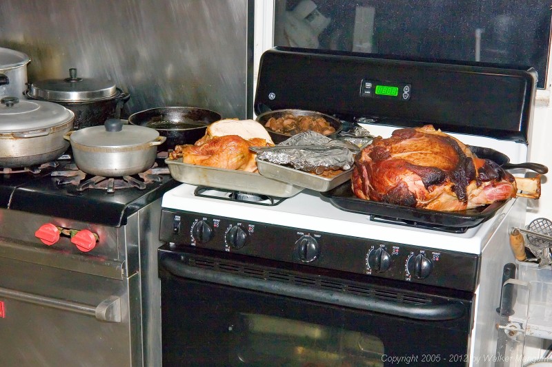 Thanksgiving dinner on the stove at Cow Wreck: Turkey, ham, stuffing, sweet potatoes...