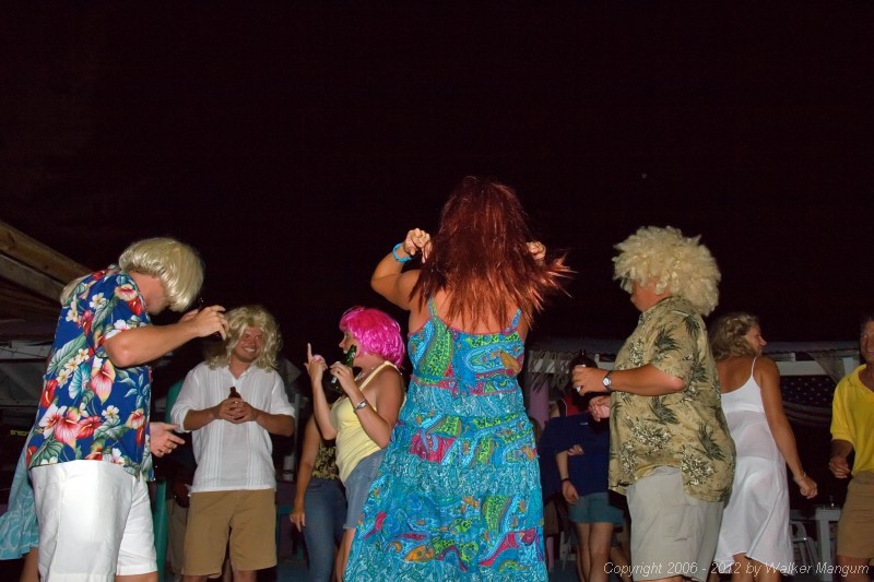 Party at Potter's. We met a group of people earlier at Neptune's that had a bag of wigs. We spent the night partying with them - swapping wigs after every dance.